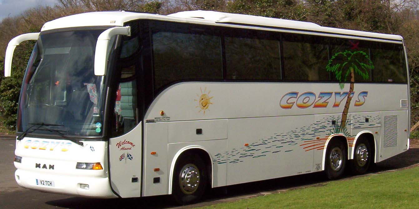 Cozys coach in white livery with palm-tree graphics