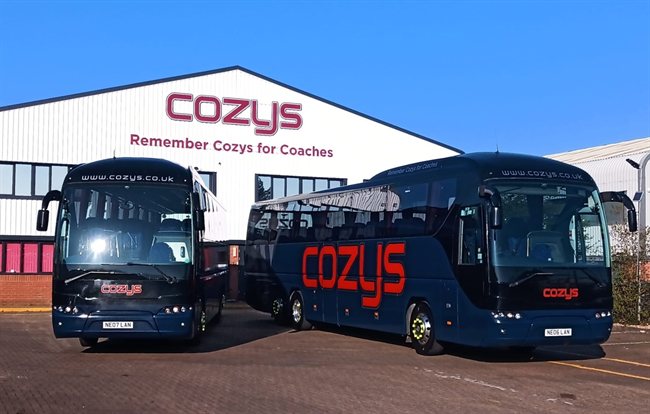 Cozys 85-seat school coaches NE06 LAN and NE07 LAN outside the Cozys depot