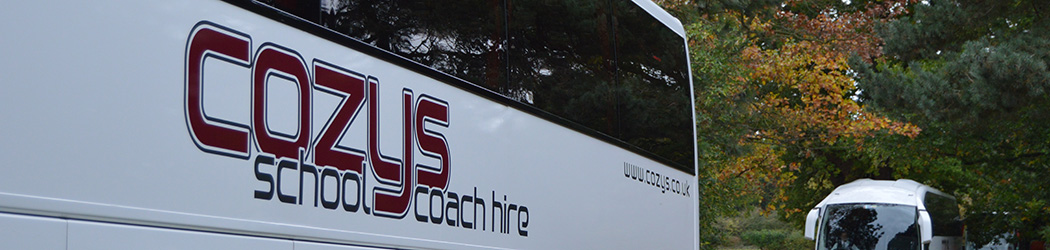 Seat-belted Cozys school coach transporting pupils safely